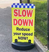 Image result for UK Slow Down Sign