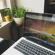 Image result for MacBook Air M2 Coffee Shop