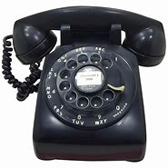 Image result for Rotary Dial Desk Phone in Use