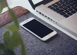 Image result for iPhone On Table