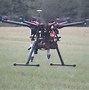 Image result for A Drone Carrying a IED
