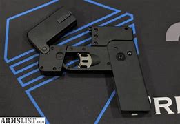 Image result for Cell Phone 9Mm Gun