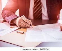 Image result for Man Signing a Contract