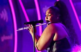 Image result for Singer Who Plays Flute Lizzo