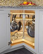 Image result for Corner Cabinet with Lazy Susan and Top Drawer