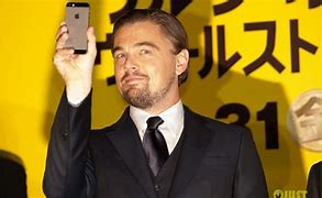 Image result for Famous Person Holding iPhone