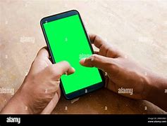 Image result for Black Hand Holding Phone Greenscreen