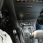 Image result for Gun On Car Door Holster