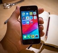 Image result for iPhone SE 1st Gen in Hand