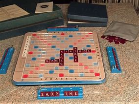 Image result for What Does the Scrabble Deluxe Version Look Like