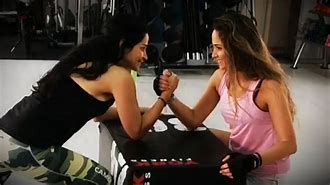 Image result for Strong Woman Arm Wrestling
