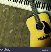 Image result for Image of a Guitar and Keyboard Intersecting