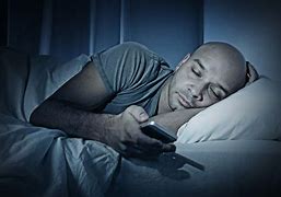 Image result for Sleep On Phone in Bed