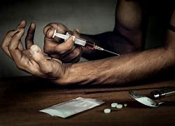 Image result for picture of a person injecting illegal drugs