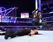 Image result for Roman Reigns vs Undertaker