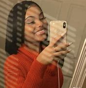 Image result for Pic of a Girl Holding a Phone Baddie