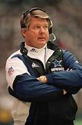 Image result for Photos of Football Coach Jimmy Johnson in the Rain and Cold