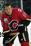 Image result for Joe Sakic Adam Deadmarsh Hockey Puck