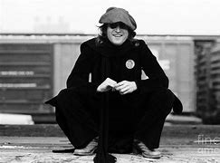 Image result for John Lennon Wearing a Cross NYC