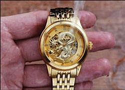 Image result for 18K Gold Chyrsos Watch