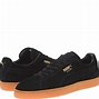 Image result for Puma Suede Black and Gold