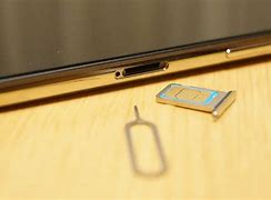 Image result for Sim Card Hole iPhone