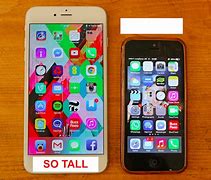Image result for Picture of an iPhone 6 White in Color and Flat On a Surface