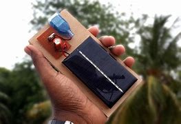 Image result for Mini Solar Cell Phone Charger