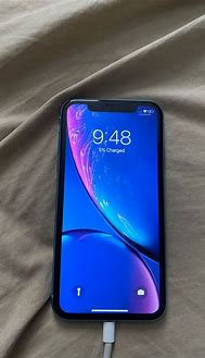 Image result for iPhone XR Blue with Hand Held