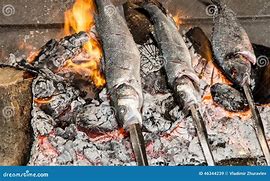 Image result for Cooking Fish Over Open Fire