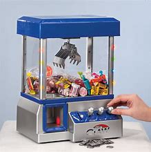 Image result for miniature toys claw machines chocolate