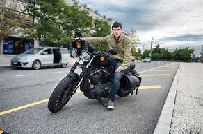 Image result for Man On Motorcycle Pointing