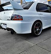 Image result for White EVO with Wheels
