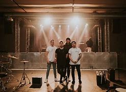 Image result for Band Standing Together On Stage