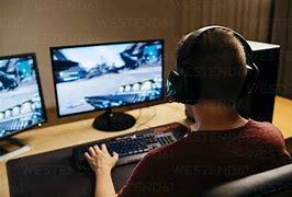 Image result for man games at computers