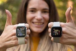 Image result for Apple Watch 5 vs Fitbit Versa 2