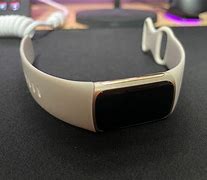 Image result for Fitbit Charge $5 Lunar White