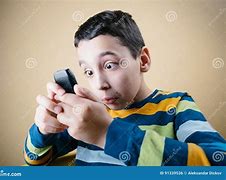 Image result for Kid Staring at Phone