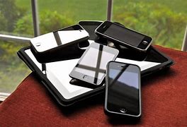 Image result for Pile of Cell Phones