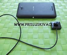 Image result for Punjac Za Mobilni Telefon Sony C1505