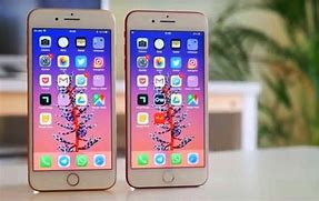 Image result for iPad Mini Next to iPhone Plus