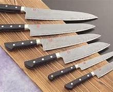 Image result for Japanese Tapped Damascus Knifes