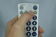 Image result for Philips Universal Remote Pause Button