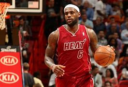 Image result for LeBron James Holding NBA Trophy