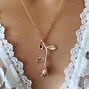 Image result for Beauty and the Beast Rose Necklace