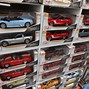 Image result for Maisto Diecast Cars Hydraulic Look Alike Stand