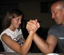 Image result for Men vs Women Arm Wrestling