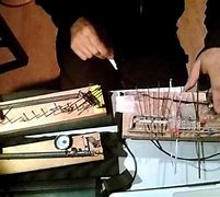 Image result for Handmade with Screws and Springs Acoustic Synthesizer