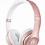 Image result for Person Wearig Rose Gold Beats