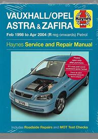 Image result for Mechanic Reviewing Maintenance Manual